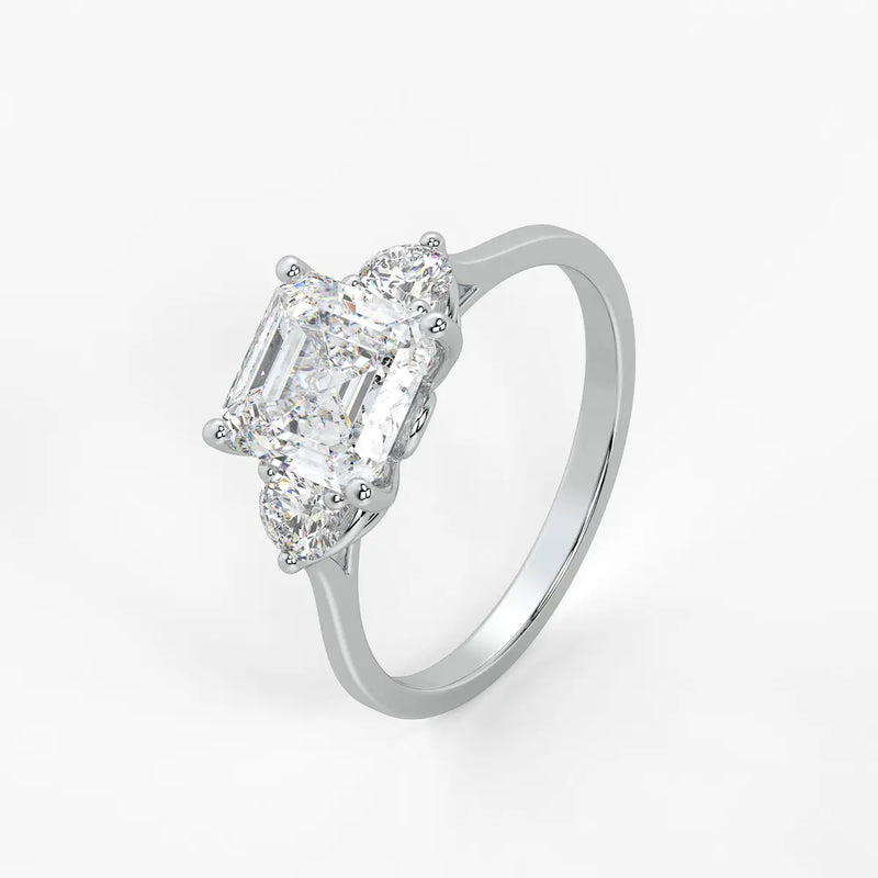 Emerald Trio Solitaire Ladies Ring