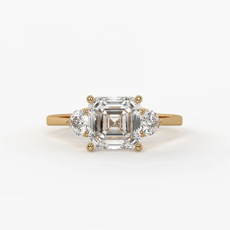Emerald Trio Solitaire Ladies Ring