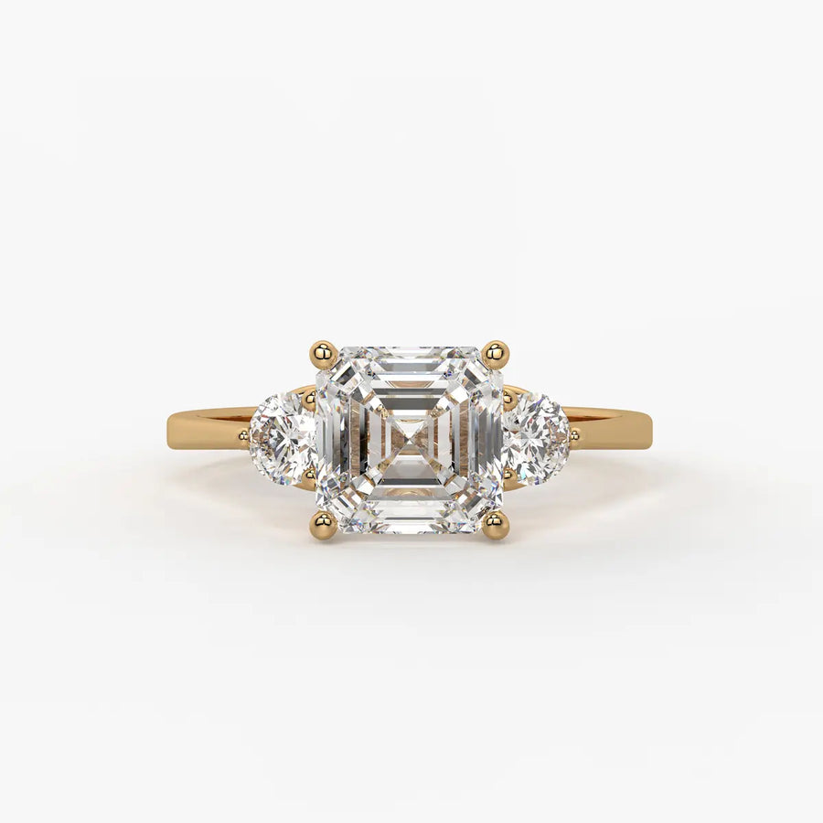 Emerald Trio Solitaire Ladies Ring
